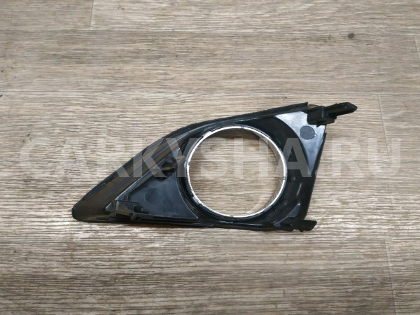 Накладка противотуманной фары правая Toyota Corolla оригинальный номер 8148112090