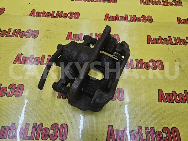 Суппорт тормозной передний левый Toyota Auris оригинальный номер 4773002341