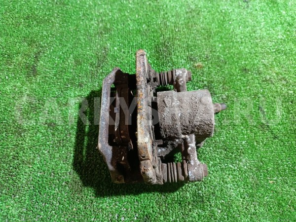 Суппорт тормозной задний правый Toyota Avensis оригинальный номер 4773005071