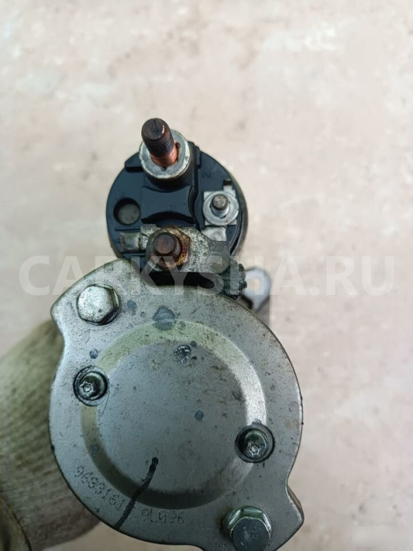 Стартер Шевролет Круз Chevrolet Cruze 1.8л АКПП Chevrolet Aveo оригинальный номер 55576980