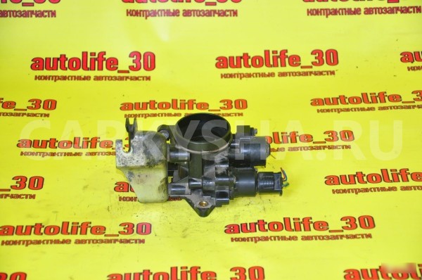 Заслонка дроссельная механическая Toyota Yaris оригинальный номер 22210B1060