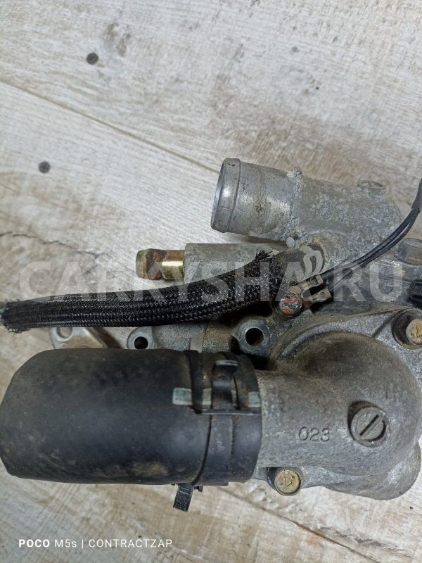 Корпус термостата Mitsubishi Outlander II (2005—2009) Mitsubishi i оригинальный номер MN149477